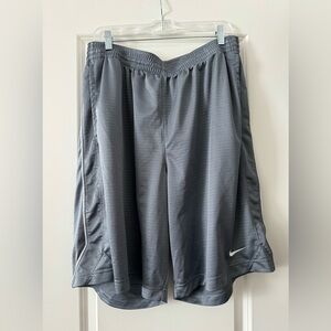 Nike men’s basketball shorts. Size XXL. Gray with white detail. Like new!